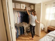 Closet Organization That Still Works in Three Months Organized reach-in closet with velvet hangers bins and shelf dividers in bedroom