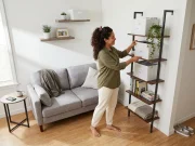 Vertical Storage Ideas for Apartments That Last Vertical storage ideas for apartments — small living room with floating shelves and narrow bookshelf