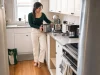 Small Kitchen Appliance Storage That Actually Fits Small kitchen appliance storage reset with a stand mixer and toaster being sorted into cabinets