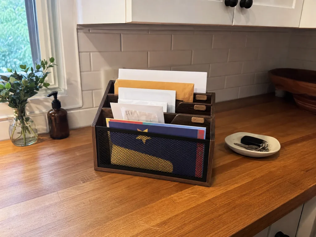 How to Declutter Kitchen Counters for Good 6 Freestanding countertop mail organizer with mail pre-sorted into labeled slots