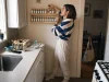9 DIY Spice Organization Ideas That Survive Month Three DIY spice organization ideas — homemade wall shelf holding refilled glass spice jars in a small kitchen
